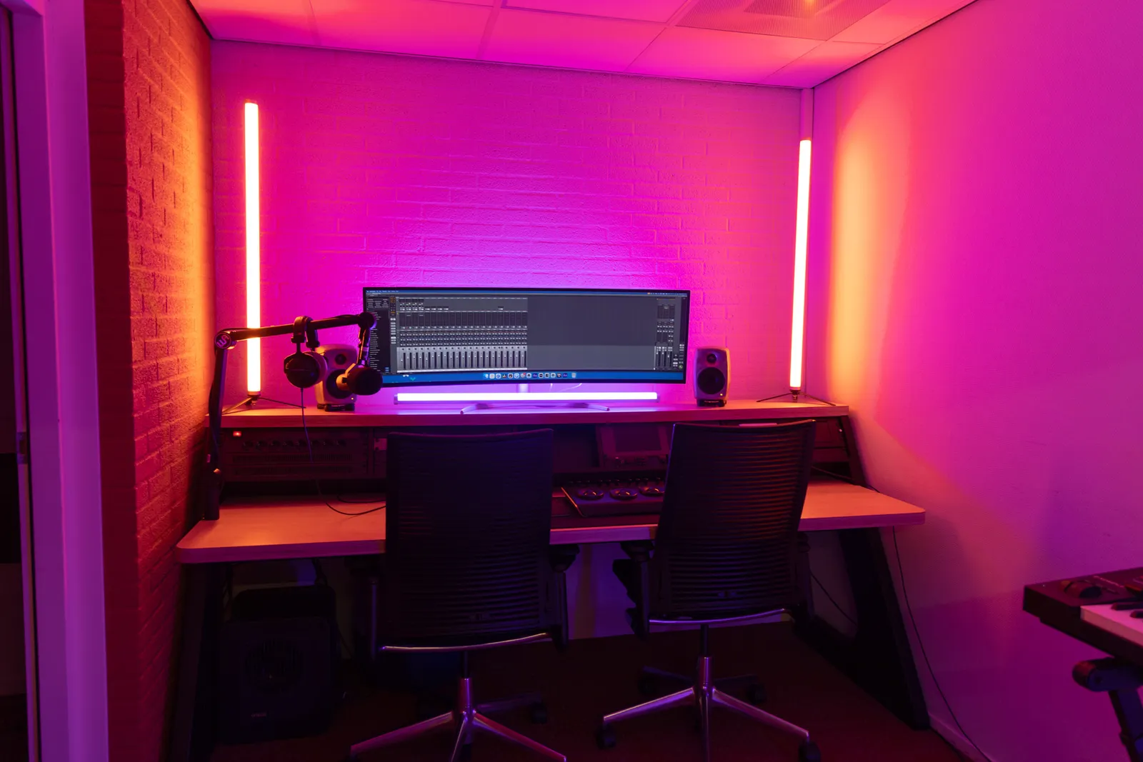Edit bay monitor and mixing console close-up