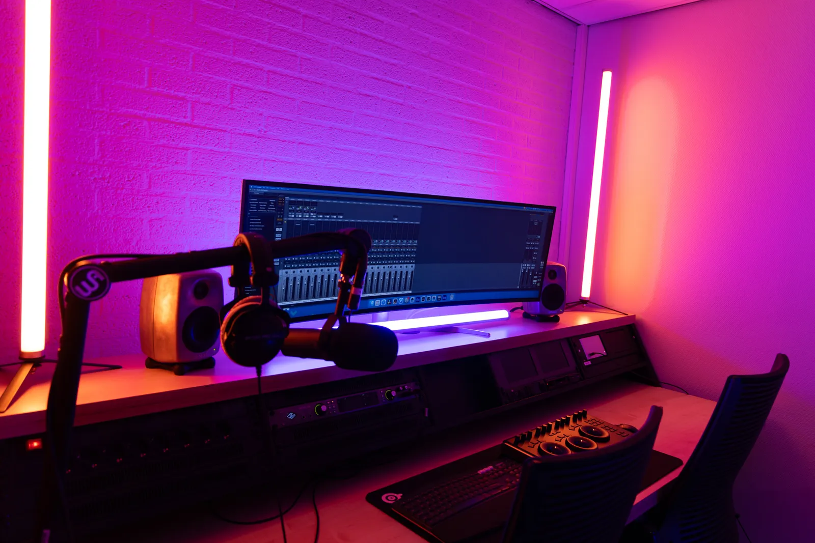 Edit bay desk with microphone arm